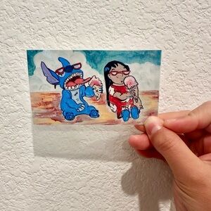 Lilo & Stitch having ice cream handmade print laminated copy artwork 2 1/2”x 4”